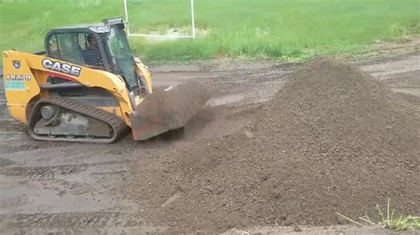 skid steer to lower grade|grading driveway with skid steer.